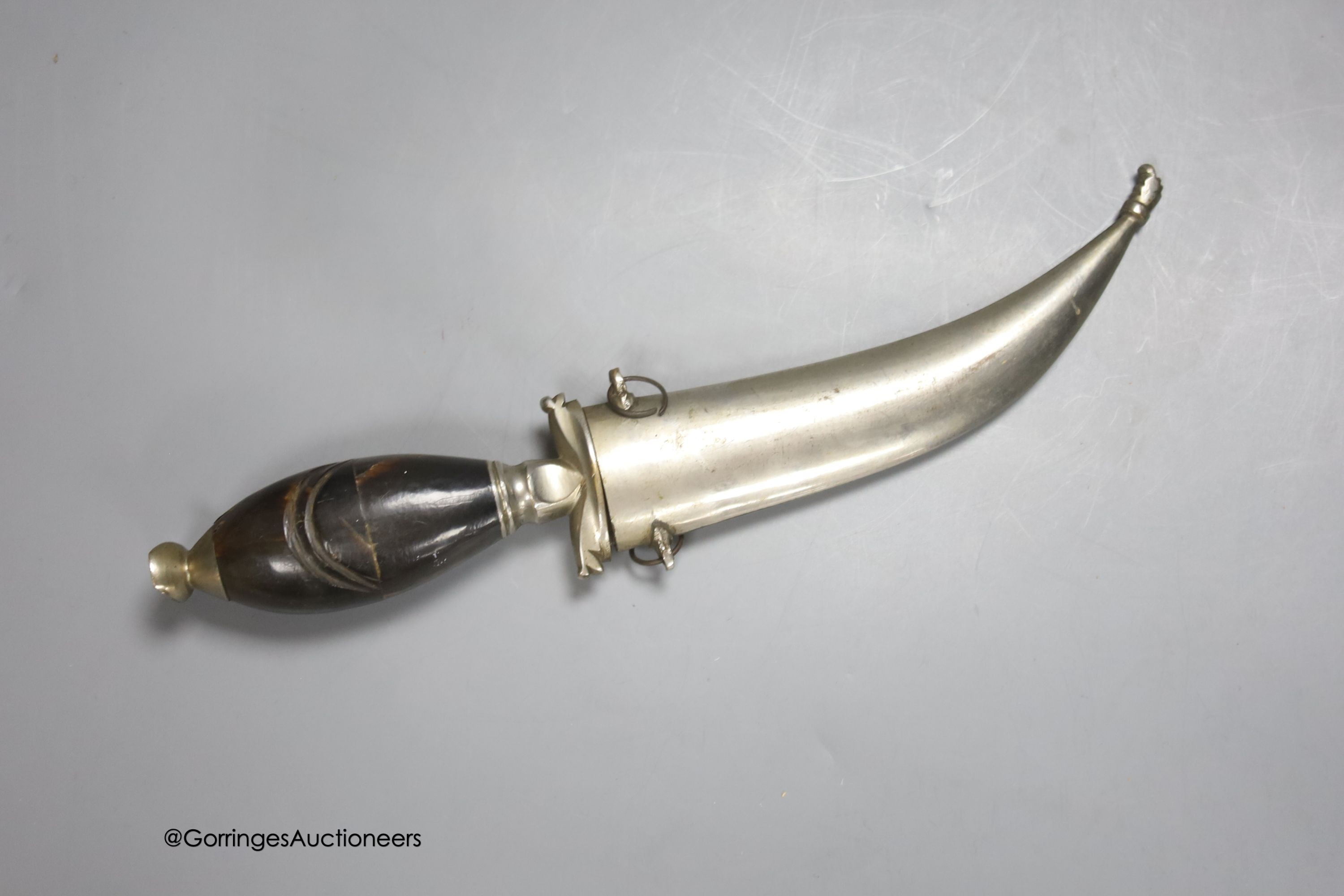 A Middle Eastern dagger, with inlaid horn handle, in sheath